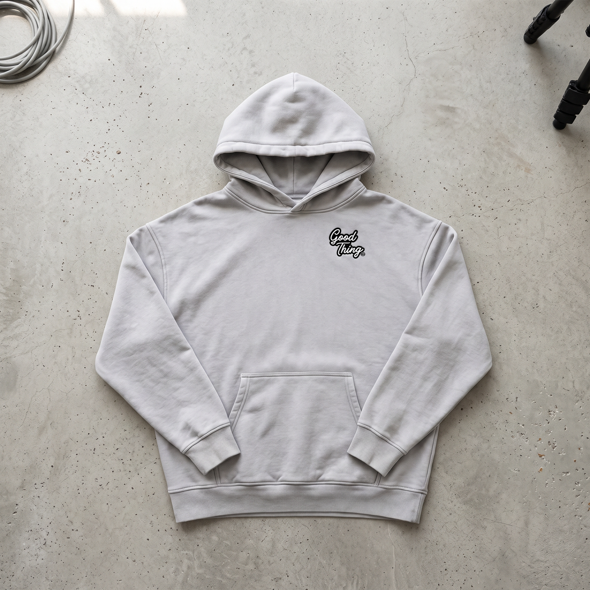 Good Thing & Co. light grey oversized fleece hoodie with a snow wash finish and small chest logo.