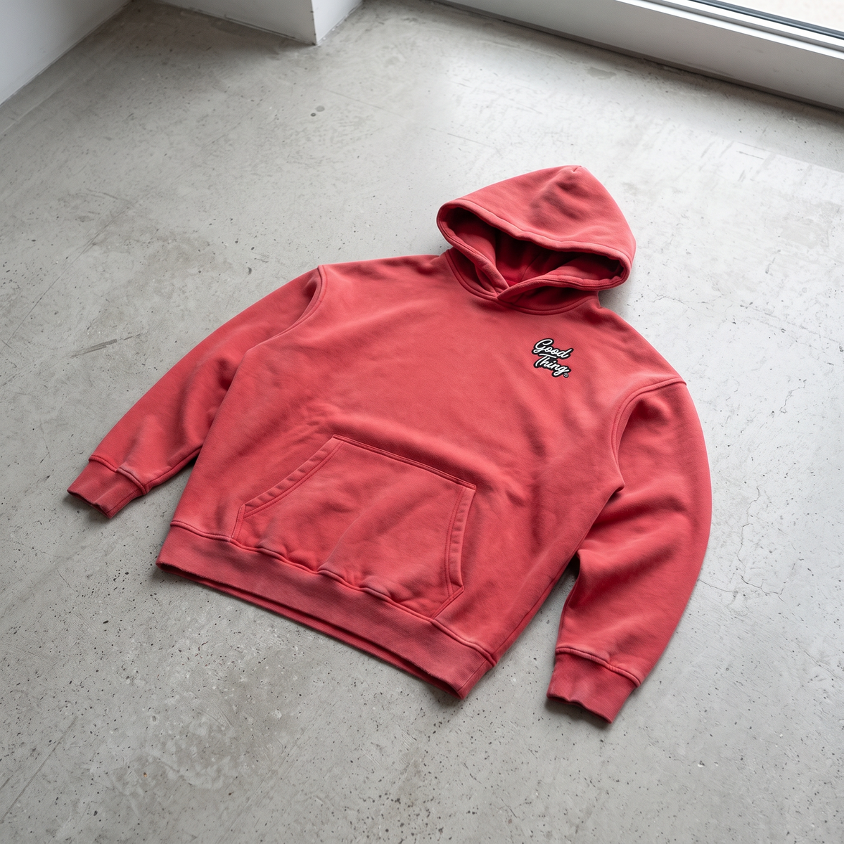 Good Thing & Co. oversized red snow wash fleece hoodie with drop shoulders and a front kangaroo pocket.